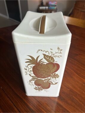 Vintage Ransburg White Metal Canister with Gold Fruit Motif and plastic lid